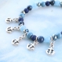 Armb&auml;nder und Ringe mit Anker in blauen Farbt&ouml;nen