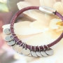 Qualit&auml;tschmuck mit Zubeh&ouml;r aus rostfreiem Stahl, DQ Leder und gef&auml;rbtem Elastik
