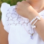 Fr&ouml;hlicher Kinderschmuck und Armb&auml;nder mit farbigem Einhorn