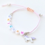 Fr&ouml;hlicher Kinderschmuck und Armb&auml;nder mit farbigem Einhorn