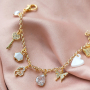 Trendige Ohrringe und Armb&auml;nder mit Zirkonia Anh&auml;nger und Zwischenst&uuml;cke: