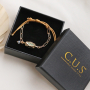 Schmuckdesigns mit C.U.S&reg; Perlen mit Botschaft aus Messing