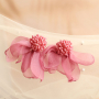 Kreieren Sie einen einzigartigen Look mit Blumen-Ohrringen