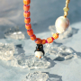 Neue Ideen: Bunte Glasperlen, die Schmuck in Szene setzen
