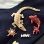 Statement-Broschen bringen Farbe, Bewegung, Ausdruck in Ihre Kollektion
