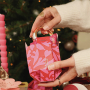 Weihnachtliche Verpackungen, die das Schmuckgeschenk festlich machen 